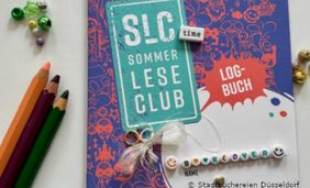Foto mit SommerLeseClub Leselogbuch, Stiften und Buchstabenperlen